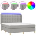 vidaXL Posteľ boxsping s matracom a LED bledosivá 160x200 cm látka