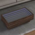 vidaXL Konferenčný stolík s LED hnedý dub 90x50x30 cm kompozitné drevo