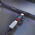 Swissten Nabíjecí Adaptér S Blokací Dat Dataguard USB-C  / USB-C  Černý bezpecnostní adaptér, blokování dat, USB-C / USB-C, až 240 W, Power Delivery, hliníkové telo