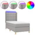 vidaXL Posteľ boxsping s matracom a LED bledosivá 90x190 cm látka