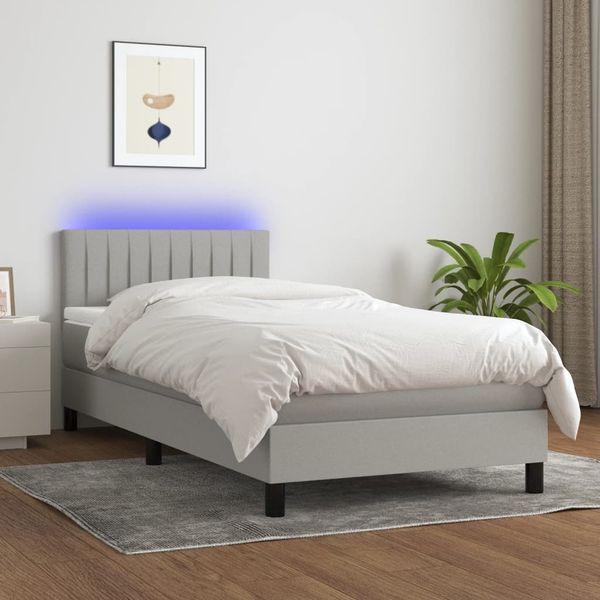 vidaXL Posteľ boxsping s matracom a LED bledosivá 90x190 cm látka