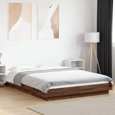vidaXL Posteľný rám s LED svetlami hnedý dub 135x190 cm kompoz. drevo