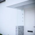 vidaXL Bočný panel pre striešku dverí priehľadný 50x100cm tvrdené sklo