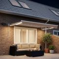 vidaXL Ručná vysúvacia markíza s LED Sivohnedá 100% polyester a hliník