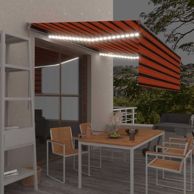 vidaXL Ručne zaťahovacia markíza s tienidlom&LED 4,5x3m oranžovo-hnedá