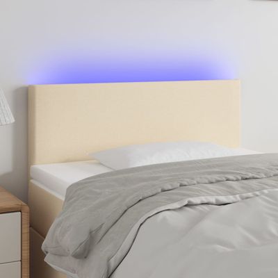 vidaXL Čelo postele s LED krémové 100x5x78/88 cm látka