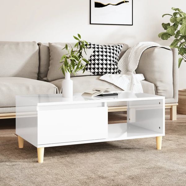 vidaXL Konferenčný stolík lesklý biely 90x50x36,5 cm spracované drevo