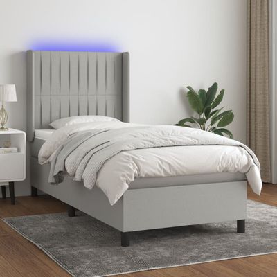 vidaXL Posteľ boxsping s matracom a LED bledosivá 90x190 cm látka