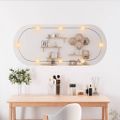 vidaXL Nástenné zrkadlo s LED svetlami 45x100 cm sklo oválne