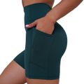 Dámske šortky Ignite Dark Green - GymBeam, veľkosť L, veľkosť oblečenia L