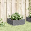 vidaXL Záhradný kvetináč s kolíkmi bledosivý 42,5x42,5x28,5 cm PP