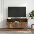 vidaXL TV skrinka Dymový dub 102 x 34,5 x 50 cm Kompozitné drevo