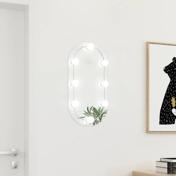 vidaXL Zrkadlo s LED svetlami 60x30 cm sklenené oválne