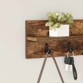 vidaXL Vešiak na stenu Nástenná montáž Dymová dub 60 x 10,5 x 18 cm