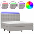 vidaXL Posteľ boxsping s matracom a LED bledosivá 160x200 cm látka