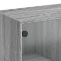 vidaXL Konferenčný stolík sklenené dvierka sivý sonoma 102x50x42 cm