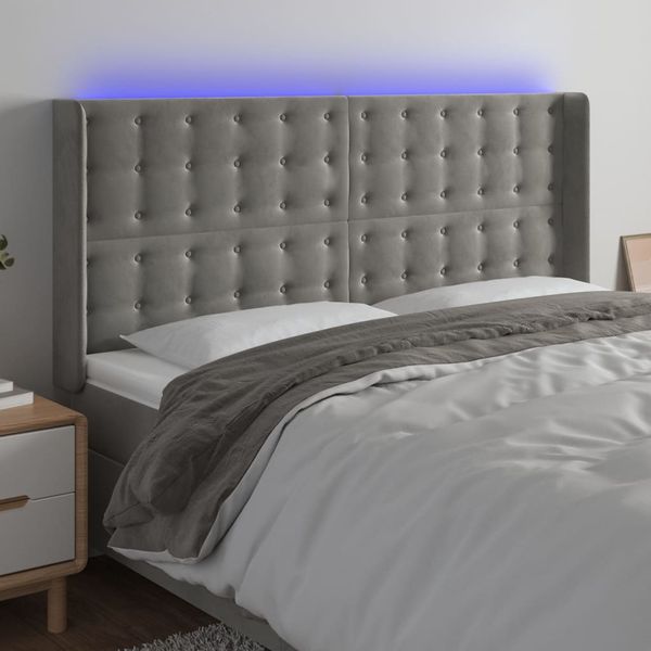 vidaXL Čelo postele s LED bledosivé 163x16x118/128 cm zamat
