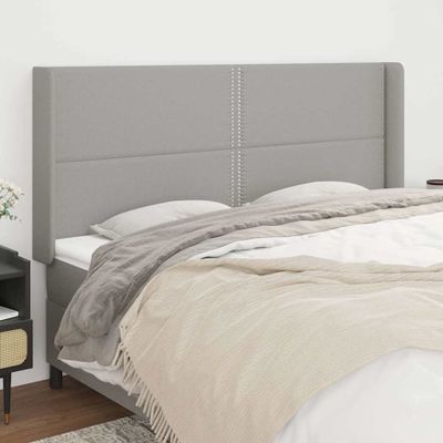 vidaXL Čelo postele so záhybmi bledosivé 163x16x118/128 cm látka